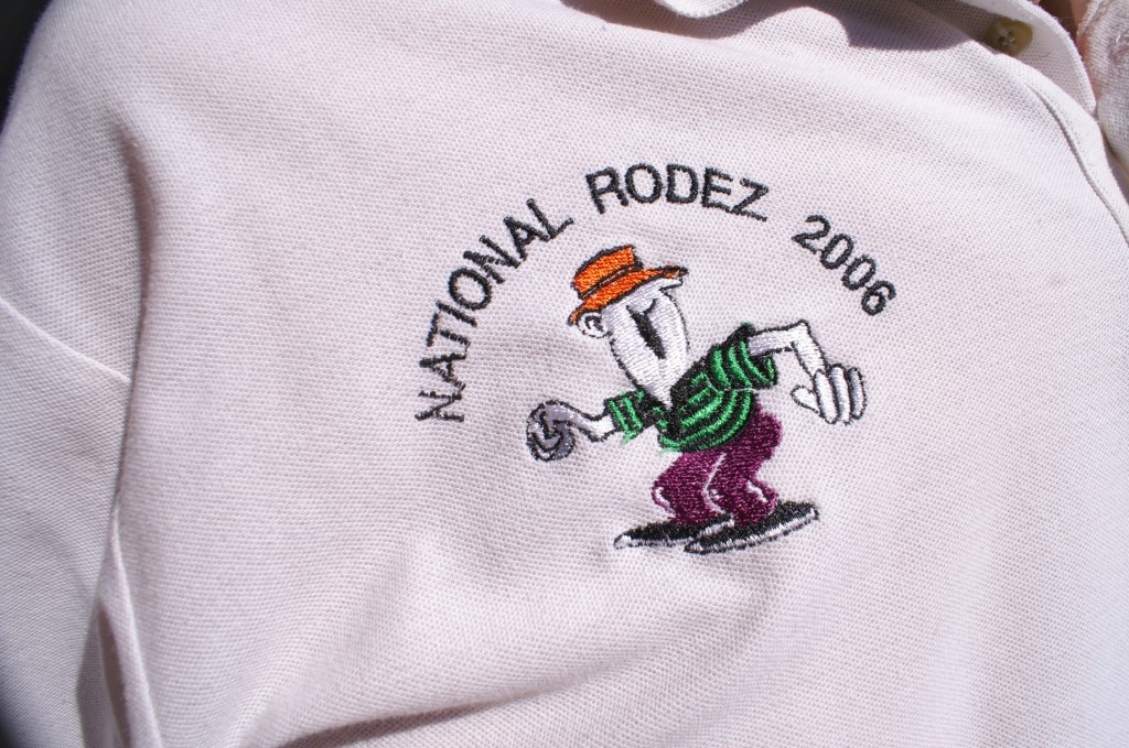 Un logo en mémoire de Jean-Trébosc qui a donné son nom à ce National Vétérans de Rodez. 